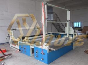 JY-F2000全自動無紡布?xì)獾饵c段分切復(fù)卷機(jī)